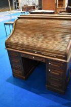 An early 20th Century oak roll top desk (af)