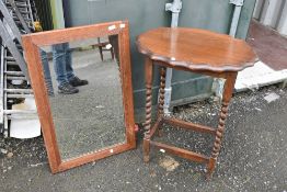 An early 20th Century oak occasional table (59 x 42cm) and Victorian oak mirror (79 x 52cm)
