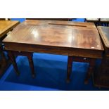 A 19th Century mahogany large clerks desk on married stained frame having turned legs, width approx.