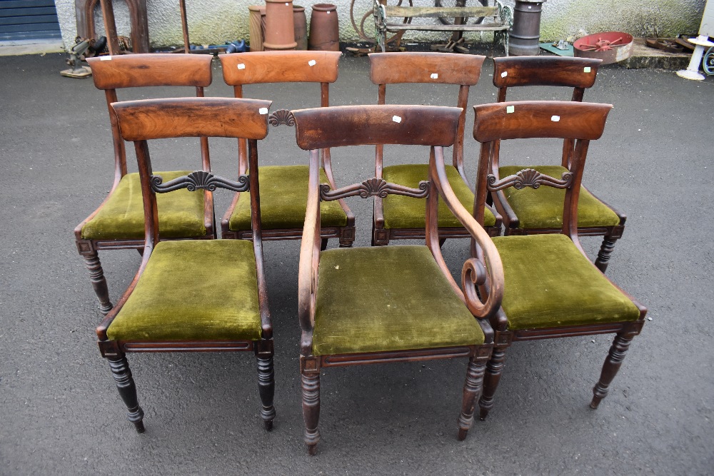A set of seven (six plus one) 19th Century Regency design dining chairs having rail backs