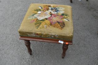 A Victorian mahogany tapestry footstool having mahogany frame