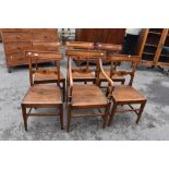 A set of six (five plus 1) 19th Century mahogany railback kitchen chairs having solid seats