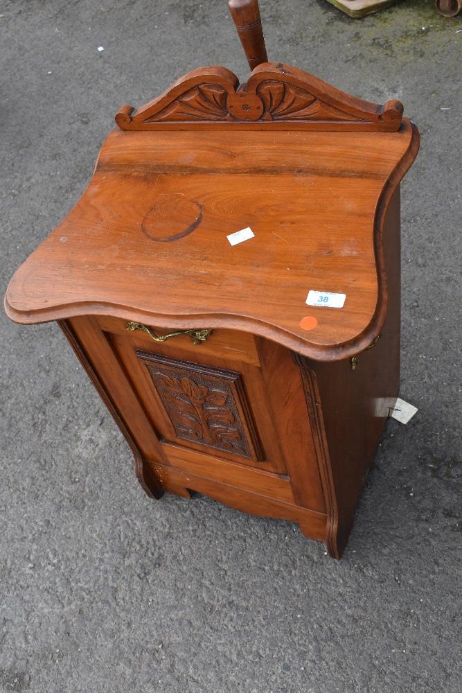 A Victorian mahogany coal purdonium