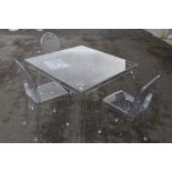 A vintage clear perspex 'Ghost' style dining table and three chairs, in the manner of La Marie by