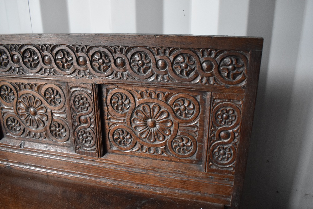 A period oak side cabinet having carved panel back , single drawer and double cupboards under, width - Image 2 of 4
