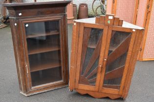 An Art Deco oak corner wall display cabinet and an earlier mahogany similar