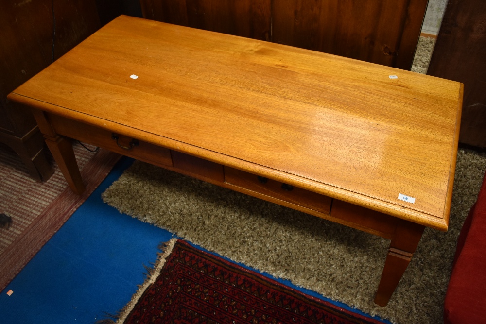 A modern hardwood coffee table, approx. 125 x 60cm