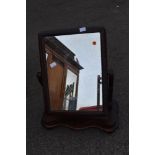 A Victorian stained frame toilet mirror
