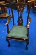 A reproduction Chippendale style carver chair