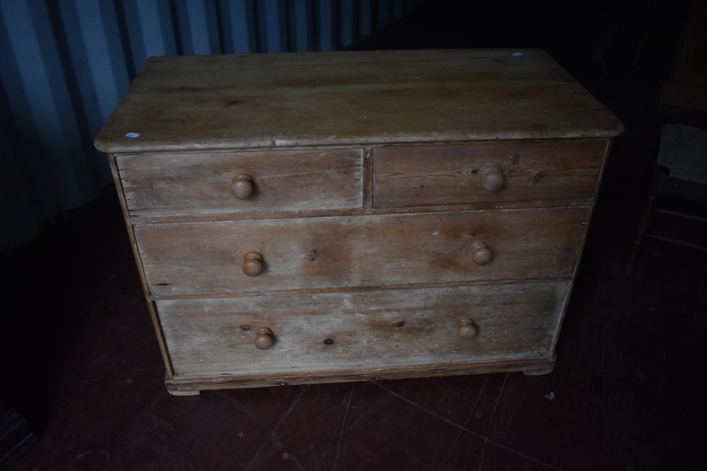 A Victorian pine low chest of two over two drawers, dimensions approx W100 D50 H69cm
