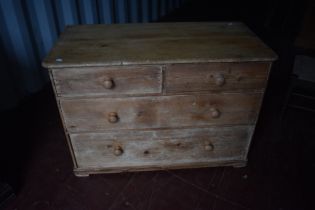 A Victorian pine low chest of two over two drawers, dimensions approx W100 D50 H69cm