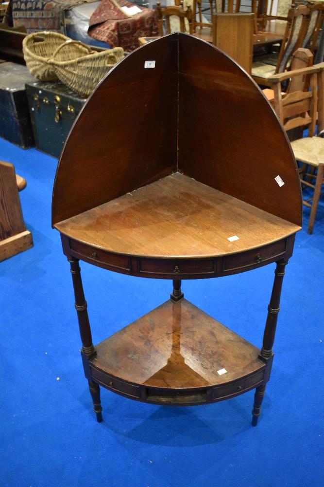 A 19th Century mahogany corner washstand or shelf, with faux drawers to both friezes