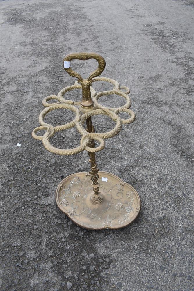 AN Art Nouveau style brass stick stand