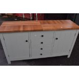 A modern sideboard having solid top, dimensions approx. W153 H86 D45