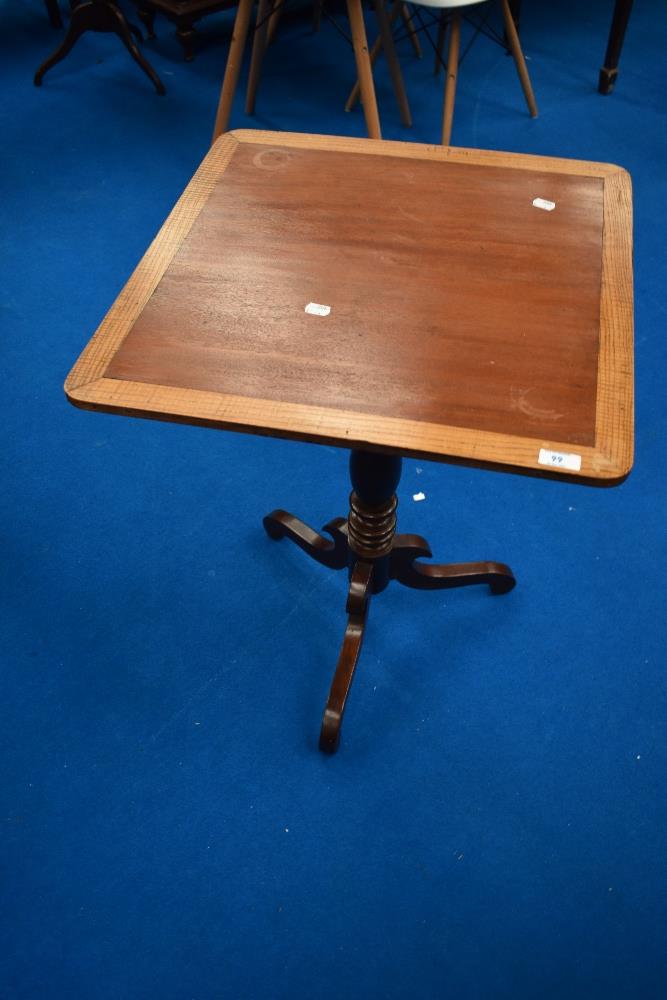 A 19th Century mahogany occasional table having turned column and triple splay supports