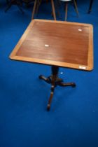 A 19th Century mahogany occasional table having turned column and triple splay supports