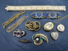 A selection of yellow metal jewellery, including three lockets of various design such as a heart