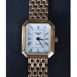 A ladies 9ct gold wrist watch by Longines, the white dial with Roman numerals, having a personalised