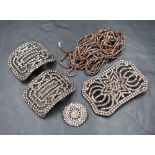 A small selection of cut steel including belt buckle, shoe buckles, button and chain