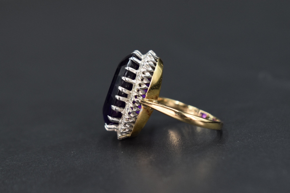 An amethyst and diamond oval cluster ring having large oval amethyst, approx 12ct surrounded by - Image 3 of 4