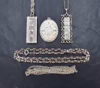 Three silver pendants commemorating the Queen Elizabeth II Silver Jubilee, comprising two ingots,