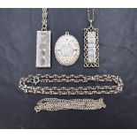 Three silver pendants commemorating the Queen Elizabeth II Silver Jubilee, comprising two ingots,