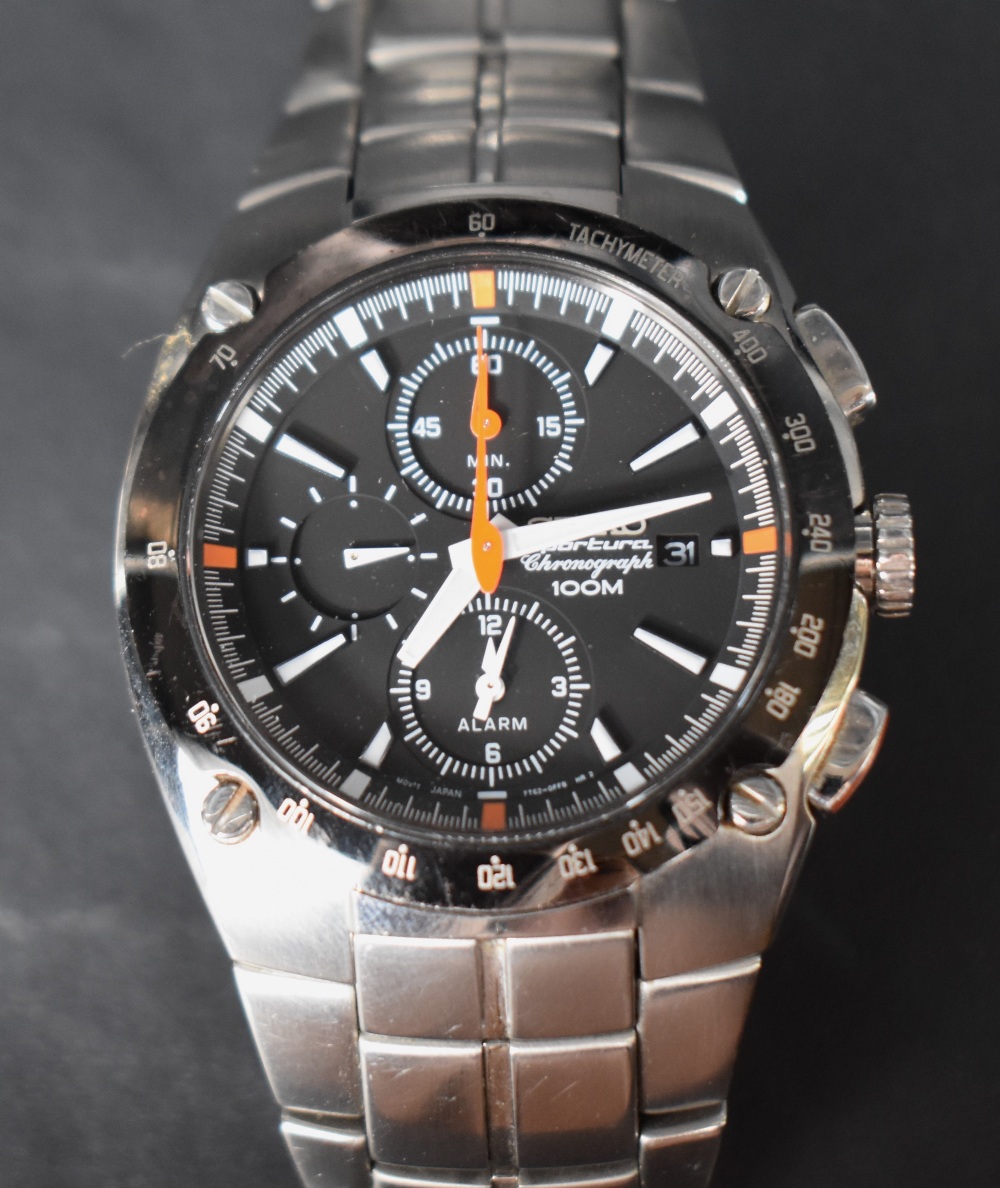 A gentlemen's Seiko wristwatch, the black dial with baton five minute markers, date aperture and