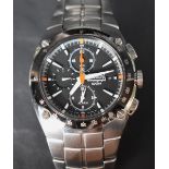 A gentlemen's Seiko wristwatch, the black dial with baton five minute markers, date aperture and