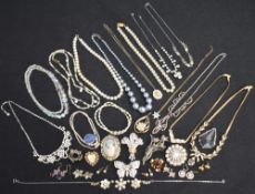 A selection of diamante and simulated pearl jewellery including necklaces, brooches and earrings