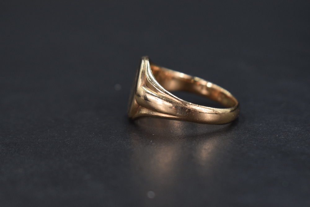 A 9ct gold signet ring, having a monogram engraved to the oval face with tapering shoulders, ring - Image 2 of 3