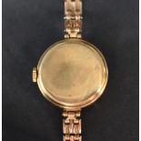 A lady's 9ct gold wrist watch by Avia having Arabic and baton numeral dial with subsidiary seconds