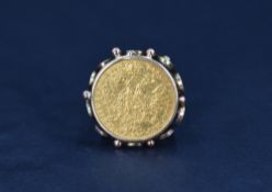 An Austrian Ducat dated 1915 in a removable yellow metal decorative ring mount, bearing marks,