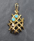 An 18ct gold pendant of stylised brutalist form having diamond and turquoise decoration, approx 7g