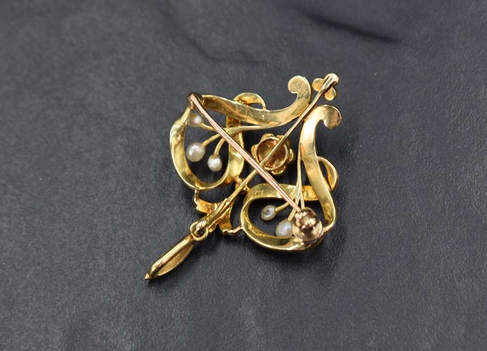 An Edwardian yellow metal brooch/pendant stamped 15ct having extensive seed pearl decoration, approx - Image 2 of 2