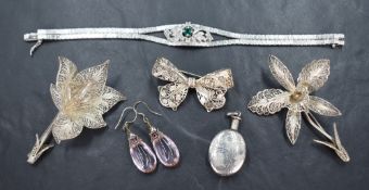 An assortment of silver and white metal jewellery comprising a silver perfume bottle pendant, a pair