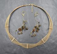 A 9ct gold multi wire collarette necklace with bar spacers, and a pair of 9ct gold wire and multi