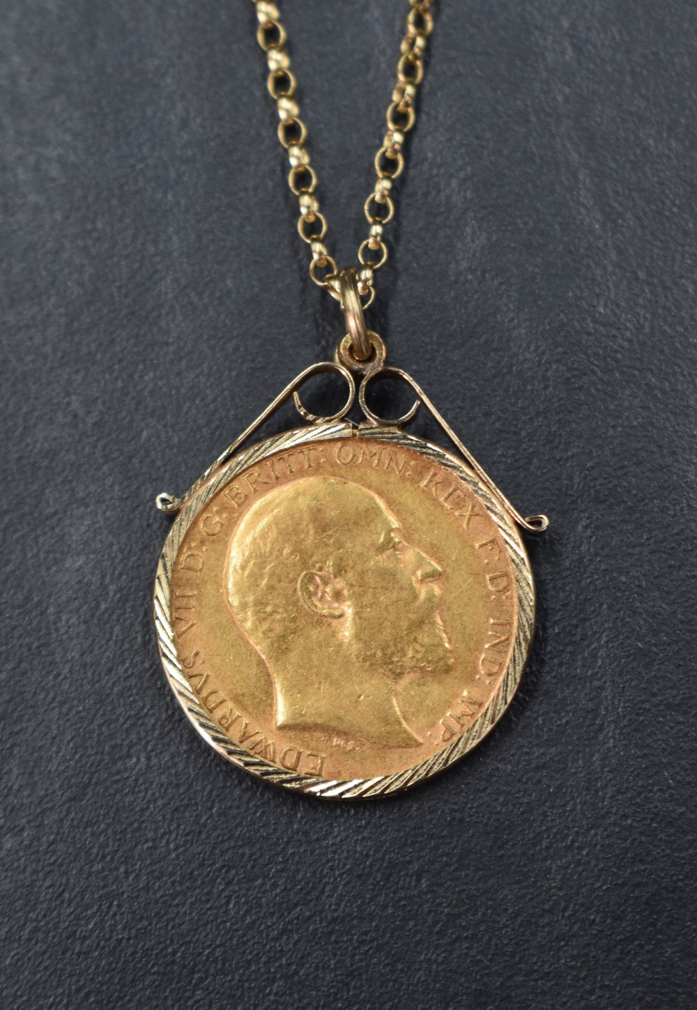 A gold half sovereign dated 1909 in a 9ct gold removable decorative pendant mount on a 9ct gold - Image 2 of 2