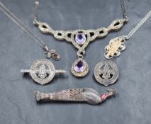 A small selection of silver jewellery including two Scout brooches, a marcasite & amethyst necklace,