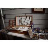 A large collection of Trout and Salmon flies in a double sided wooden case and 8 pocket boxes