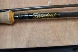 A Laser Boron 3pc 11ft 4in fly rod and a copperhead 7ft 2pc fly rod both in soft sleeves