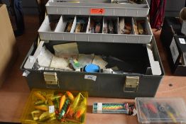 A medium sized tackle box full of minnows,lures and spinners some new and most are in excellent