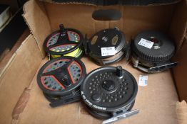 Five fly fishing reels including two Leeda LC100, Dragonfly concept disk 395, Intrepid gear fly, and