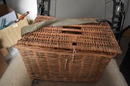 A wicker fishing basket measuring 50cm x 35cm x 37cm
