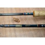 Three fly fishing rods A Daiwa Graphite trout 2pc 10ft #7-9 and a Shakespeare radial carbon 2pc 10ft