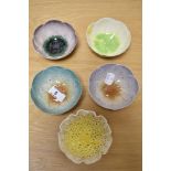 Five modern floral shaped sundea bowls.