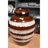 A large mid century West German brown and cream glazed vase.