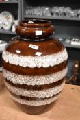 A large mid century West German brown and cream glazed vase.