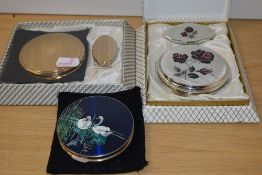 A Stratton powder compact and lipstick holder in original box along with two similar machine