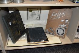 A selection of local ephemera including scrapbooks and newspapers.