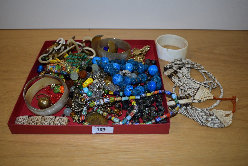 An assortment of costume jewellery including various beaded necklaces, statement collar necklaces